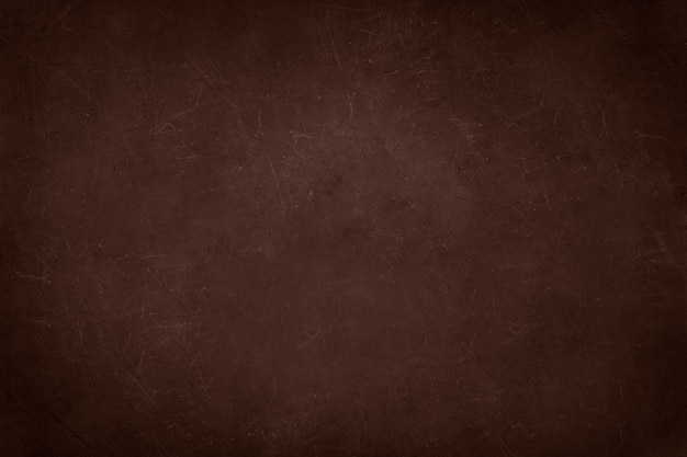 Free Photo brown concrete wall with scratches