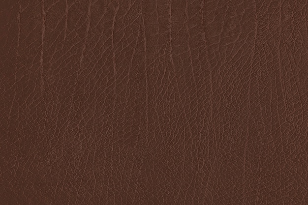 茶色の折り目が付いた革の織り目加工の背景