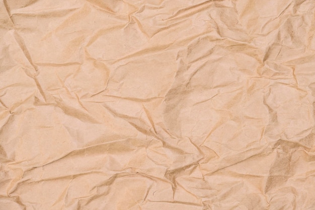 Brown crumpled paper texture background,be crush paper for creased and wrinkled for texture backdrop from shockproof paper