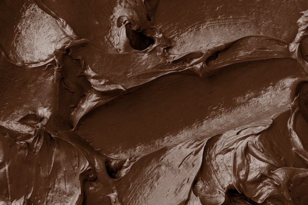 Brown frosting texture background close-up