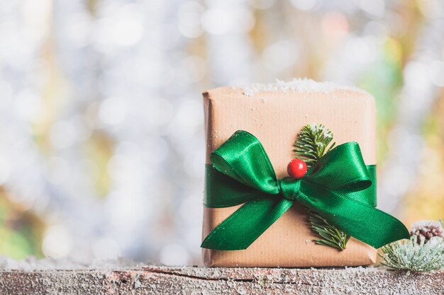 Brown gift with a green bow