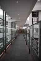 Free photo brown and gray hallway with glass windows