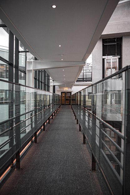 Brown and gray hallway with glass windows