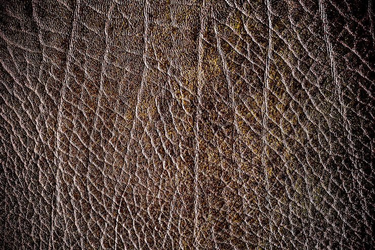 मुफ़्त फोटो brown leather background