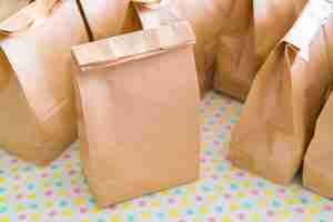 Free photo brown paper bags on table .