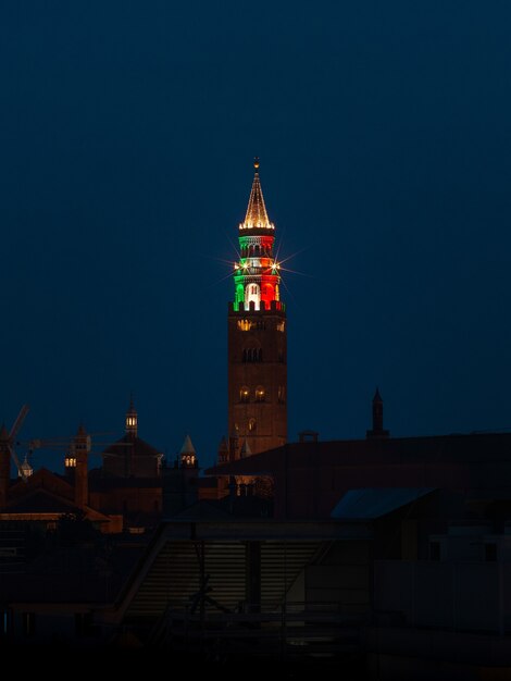 Brown and red tower during night time