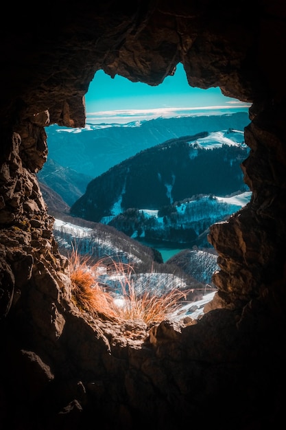 Brown rocky mountain with snow