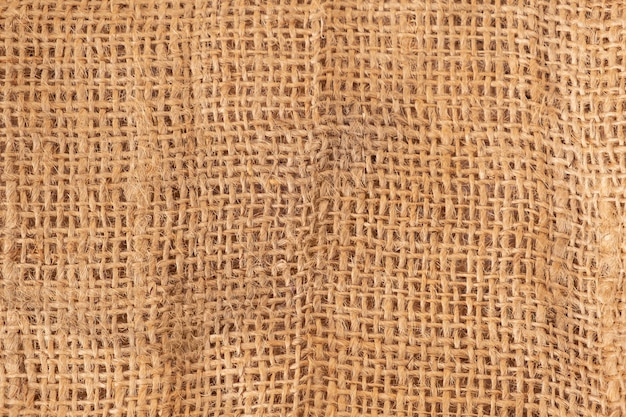 Brown sackcloth texture as a background, close up.