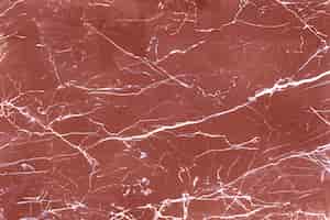 Free photo brown scratched marble textured background