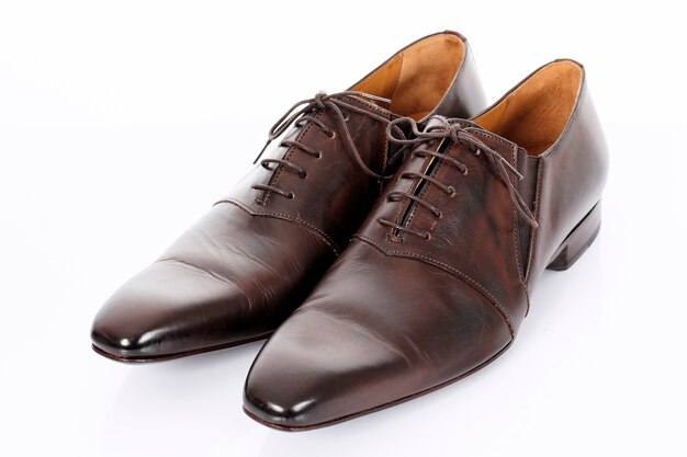 Brown shoes isolated on the white background in studio