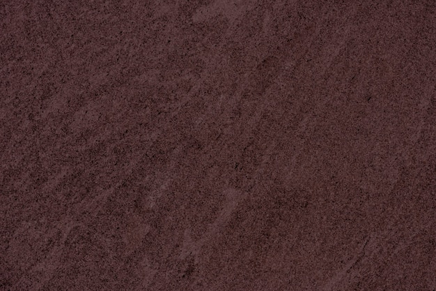 茶色の滑らかなコンクリートの壁の背景