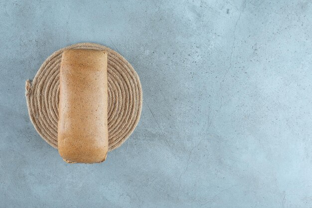 Brown toast bread on marble surface.