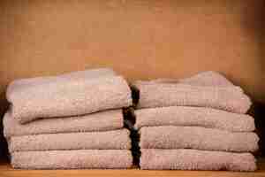 Free photo brown towels sitting on the shelf