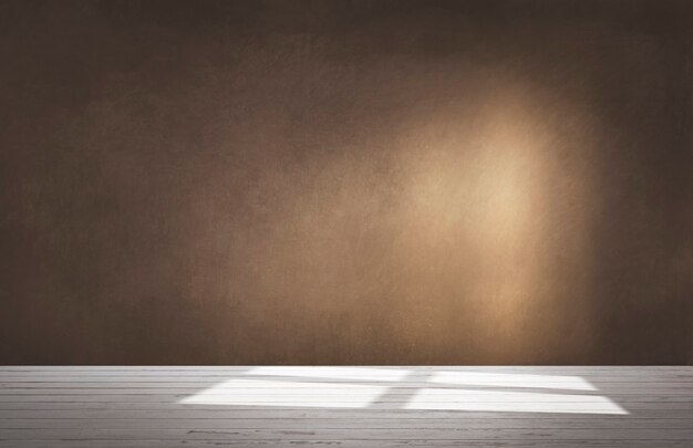 Brown wall in an empty room with concrete floor