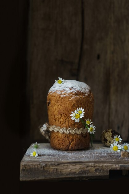 Brown and white cake on brown wooden table