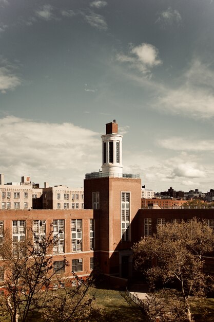 Free photo brown and white concrete building under blue sky during daytime