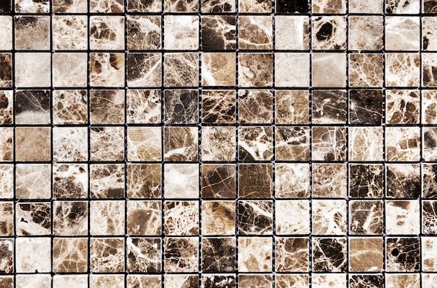 Free photo brown and white grid pattern marble wall