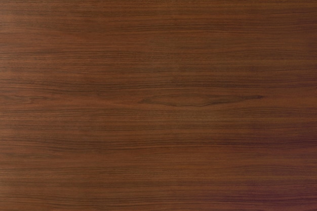 Бесплатное фото Текстурированный фон коричневого дерева с пространством дизайна