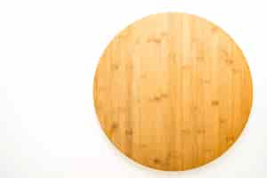 Free photo brown wooden cutting board