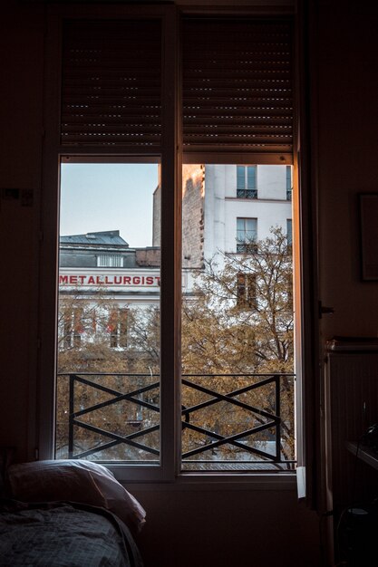 Brown wooden framed glass window