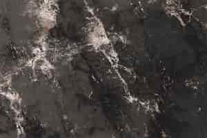 Free photo brownish black marble textured background