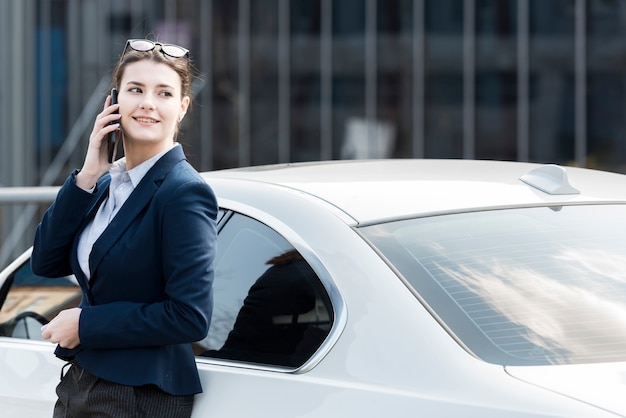 Brunette businesswoman outdoors