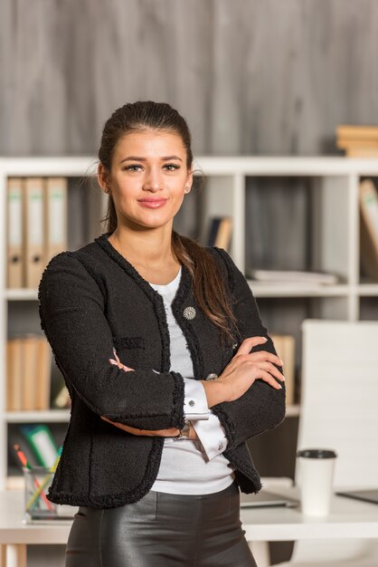 Brunette businesswoman posing