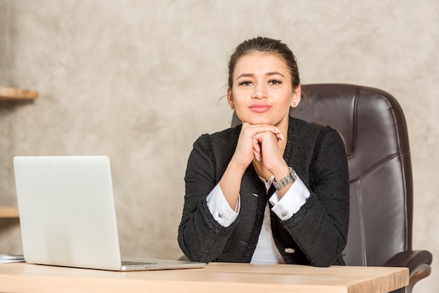 Brunette businesswoman posing