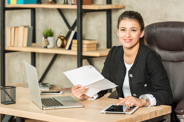 Brunette businesswoman posing