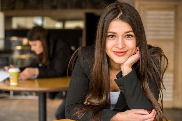 Brunette businesswoman posing