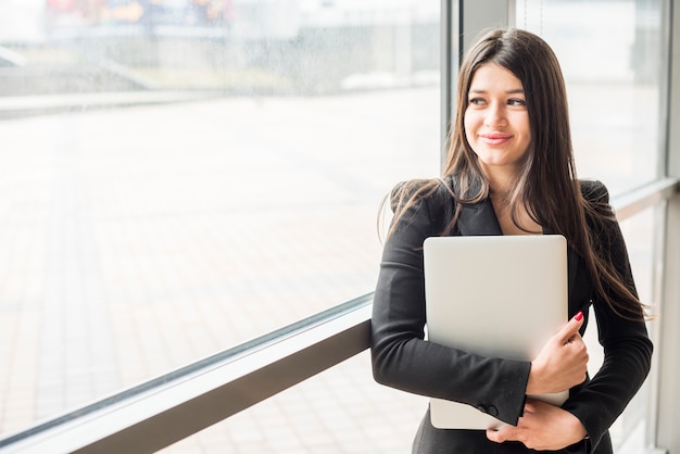 Brunette businesswoman posing