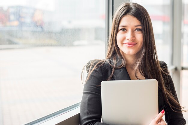 Brunette businesswoman posing