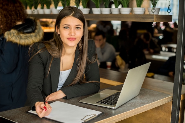 brunette businesswoman posing