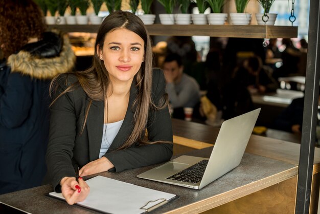 Brunette businesswoman posing