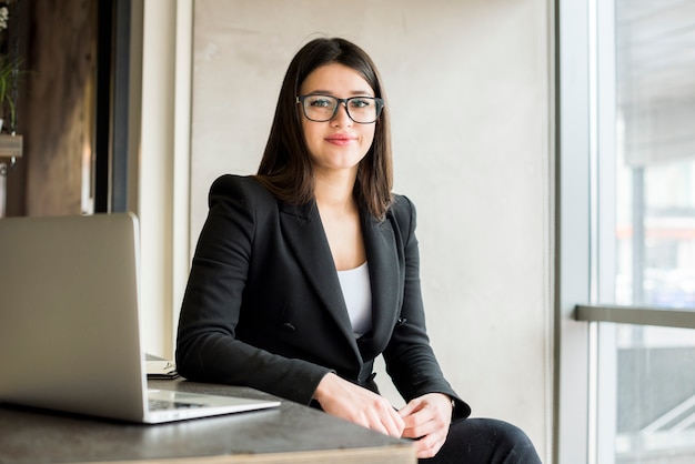 Brunette businesswoman posing