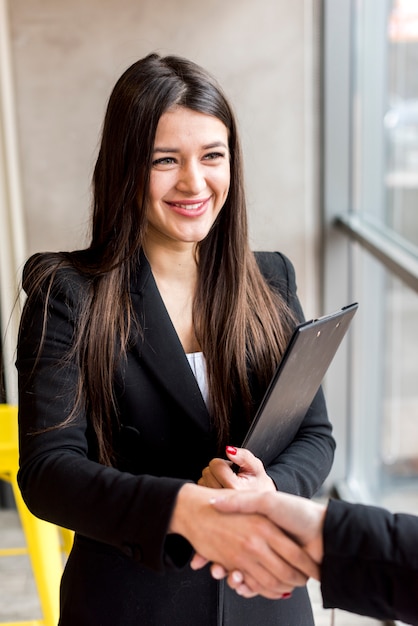 Brunette businesswoman posing