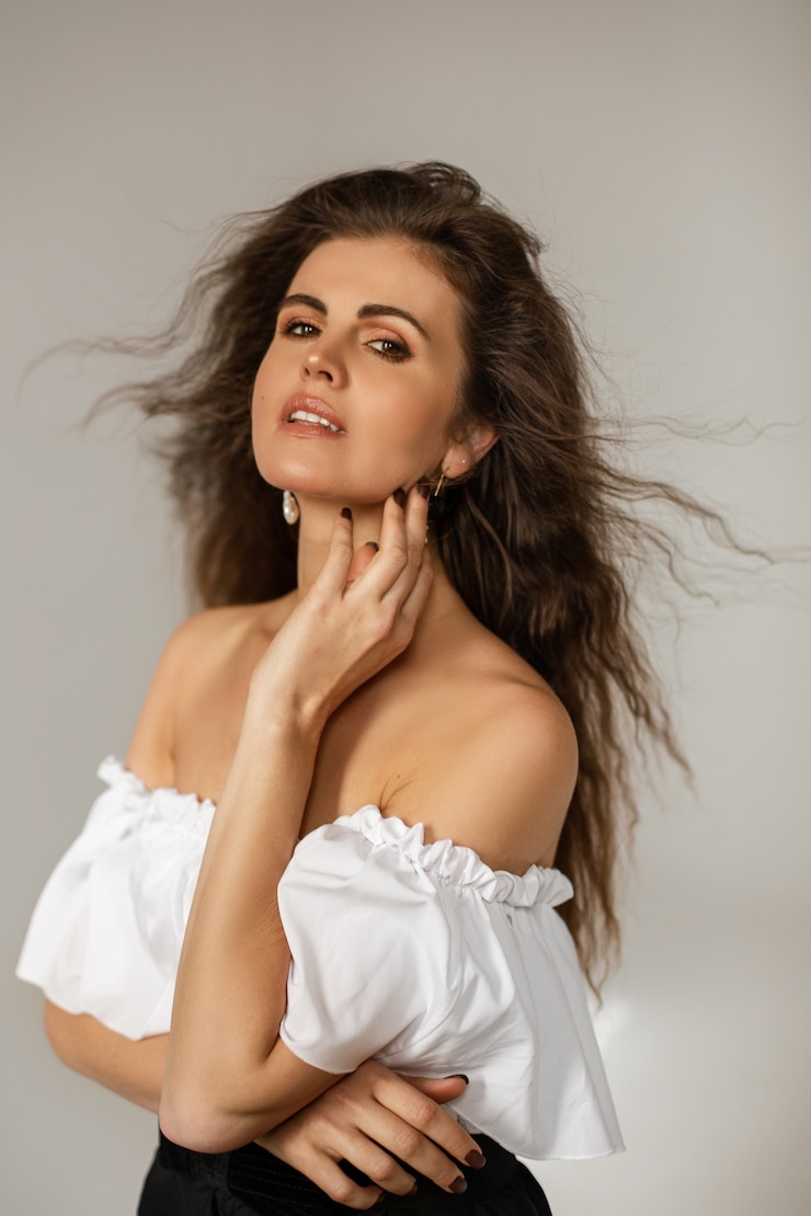 Free Photo brunette female wearing white blouse and black skirt