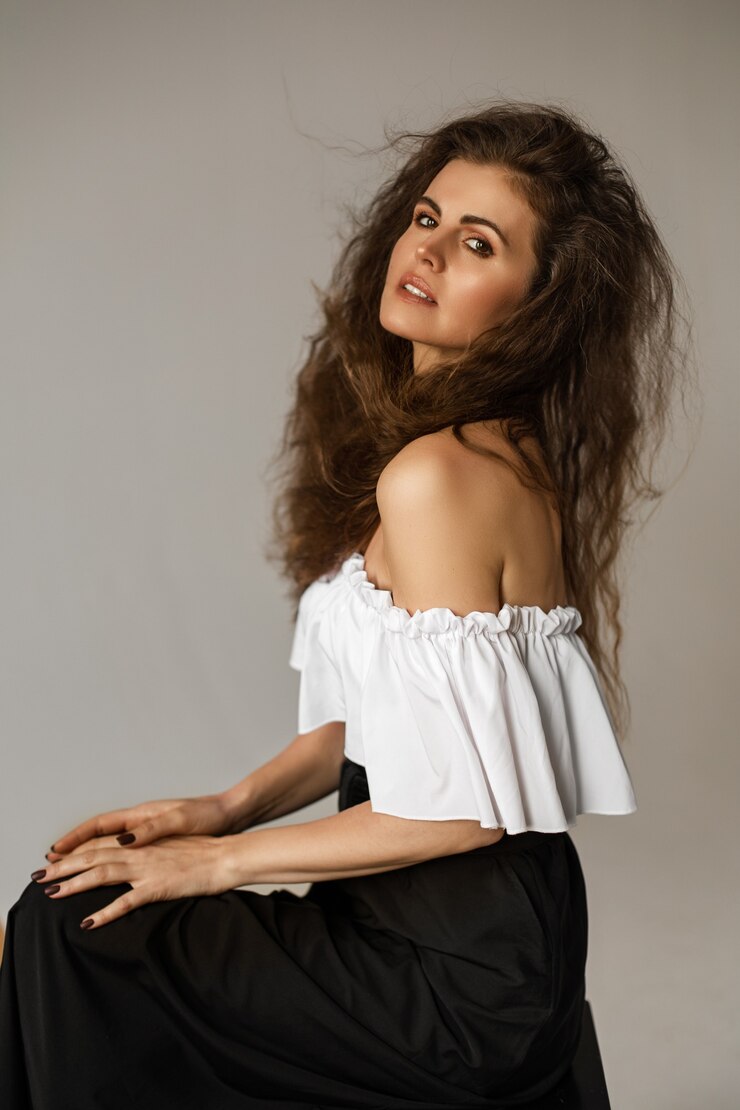 Free Photo brunette female wearing white blouse and black skirt