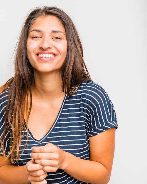 Brunette girl posing with striped t-shirt