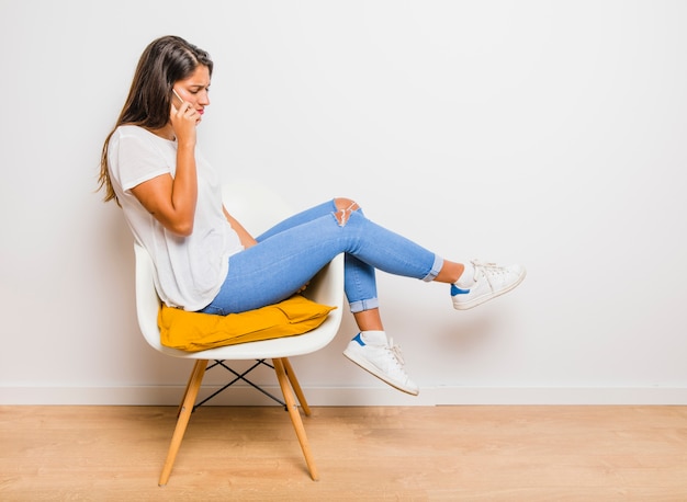 Brunette girl talking on phone