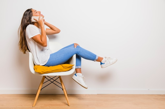 Free photo brunette girl talking on phone