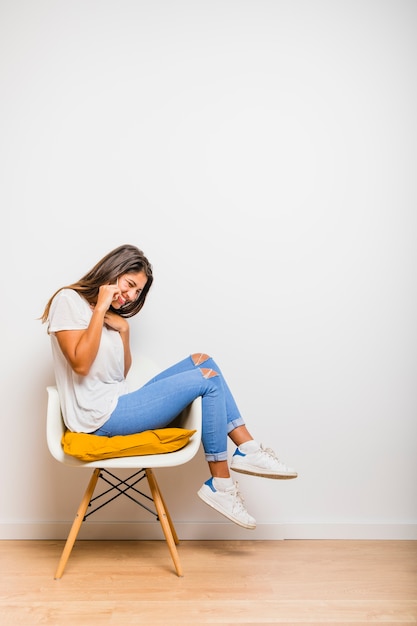 Brunette girl talking on phone