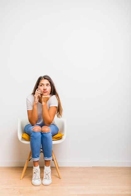 Brunette girl talking on phone