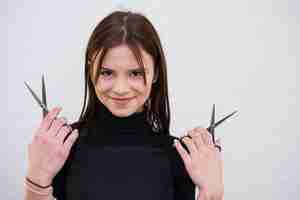 Free photo brunette girl with scissors