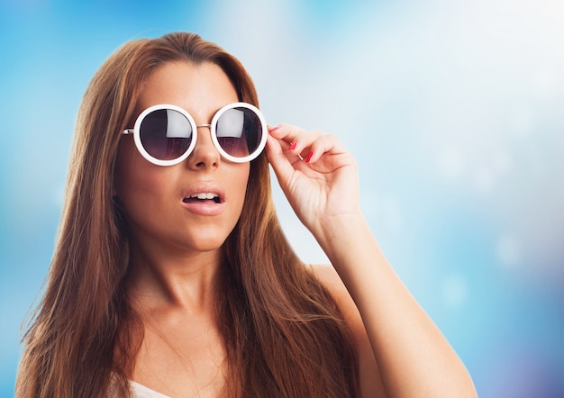 Free photo brunette glasses model background portrait