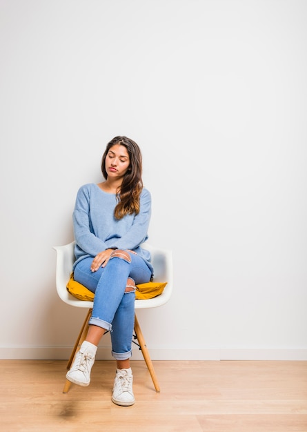 Brunette model bored sitting