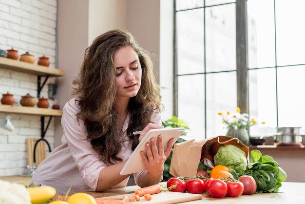 Brunette woman in the kitchen