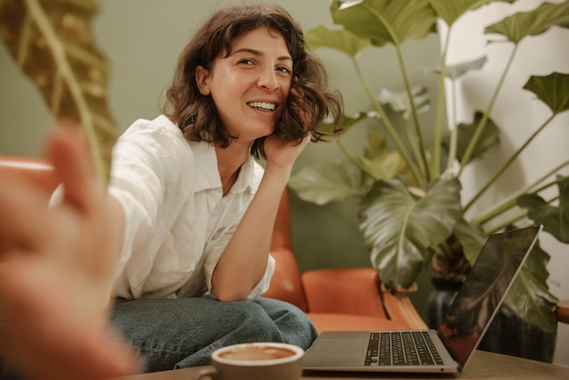 Brunette woman smiling at camera