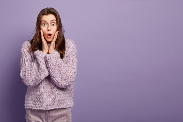 Brunette woman wearing knitted sweater