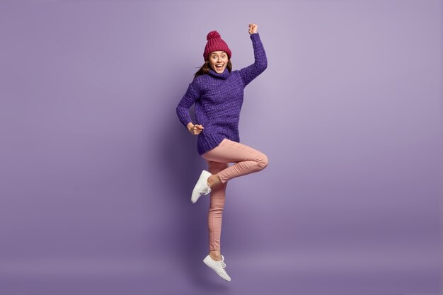 Brunette woman wearing knitted sweater